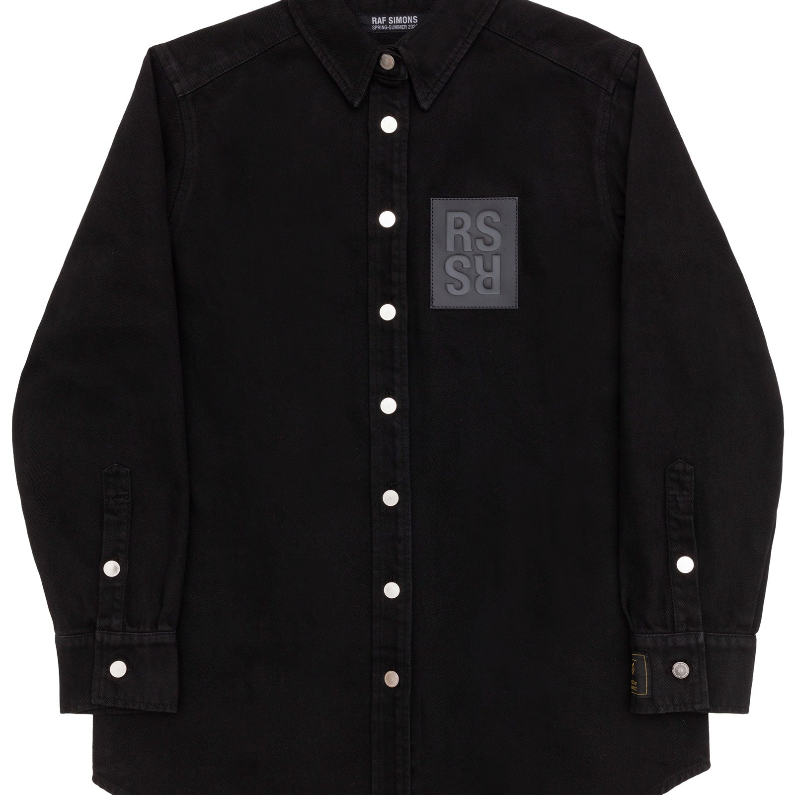 Raf Simons. Straight fit denim shirt with label on sleeve